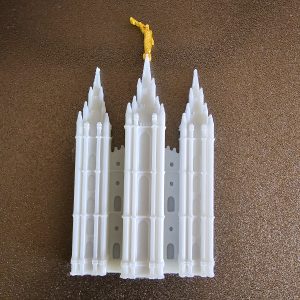 A 3d printed magnet of the Salt Lake City UT Temple's front face.