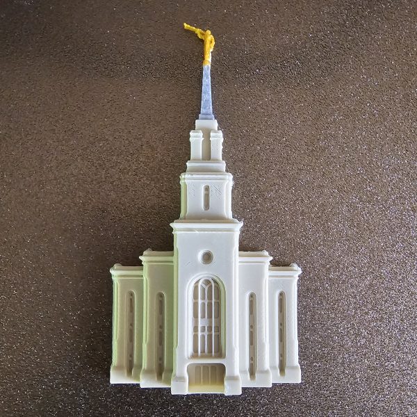 A 3d printed magnet of the Layton UT Temple's front face.